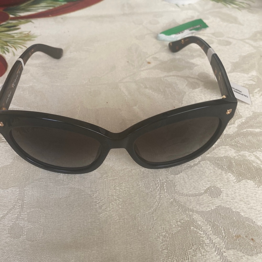 Brand new sun glasses.